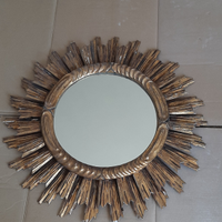 Specchiera a forma di sole in legno dorato