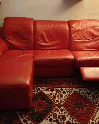 divano in pelle con penisola e movimento relax