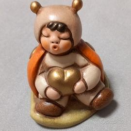 statuina bimbo coccinella Thun
