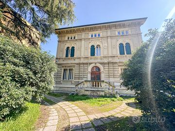 BILOCALE CON GIARDINO PRIVATO