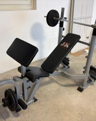 Panca con 130 kg pesi