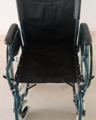 Carrozzina pieghevole da transito