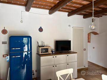 Appartamento con finiture di pregio e giardino