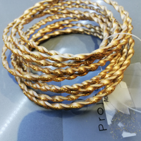 Bracciali rigidi color oro NUOVO