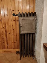 antiquariato -termosifone con scalda vivande ghisa