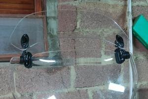 Deflettore aggiuntivo per cupolino moto