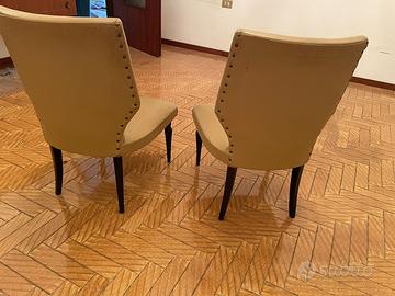 Coppia di poltrone in pelle