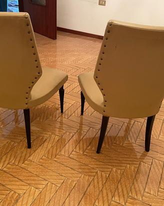 Coppia di poltrone in pelle