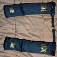 Paratibie Leone misura L 2025 - come nuove 