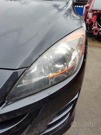 Proiettore sinistro MAZDA 3 del 2009