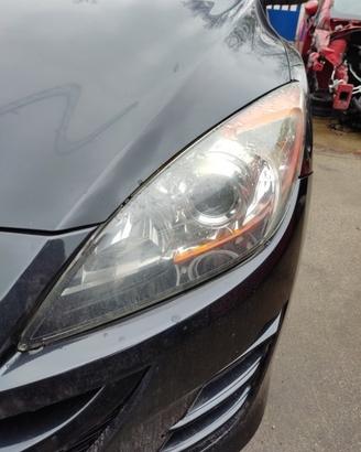 Proiettore sinistro MAZDA 3 del 2009