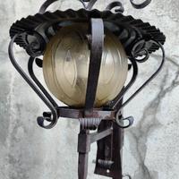 lampada da parete x esterno in ferro e vetro. 