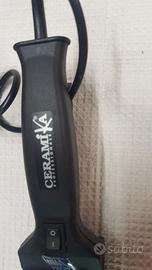 piastra per capelli elettrica. 