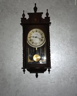 Orologio a pendolo da parete
