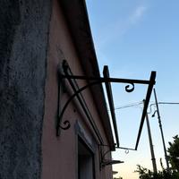 Pensilina in ferro battuto