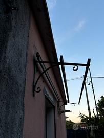 Pensilina in ferro battuto