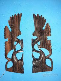 Soprammobili in legno a forma di uccelli