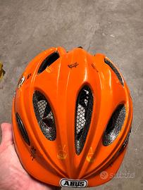 Casco bici ABUS arancione con robot tg. bimbo