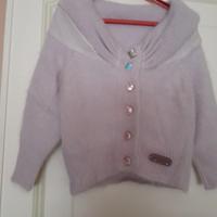 Cardigan corto glicine con maniche  tre quarti. 