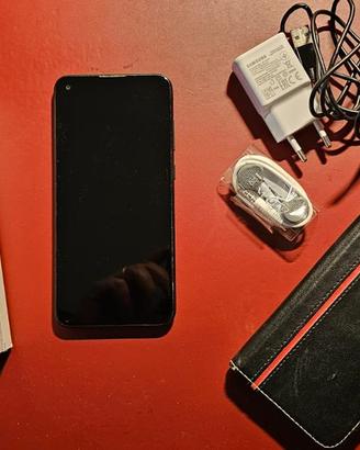 Samsung Galaxy M11 con accessori e foderino