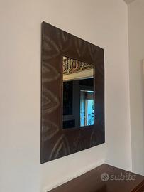 Specchio in cornice etnica