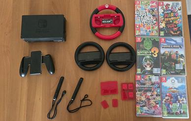 Nintendo Switch + 9 Giochi + Volanti
