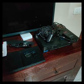 PlayStation 2 Slim + Accessori e 24 Videogiochi