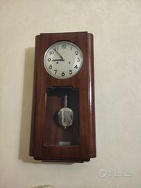 Orologio a pendolo a parete da revisionare