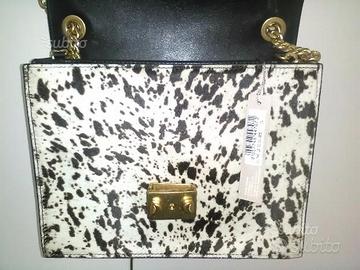 Borsa e scarpe Coccinelle in cavallino