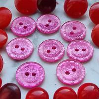 Bottoni vintage rossi e fucsia