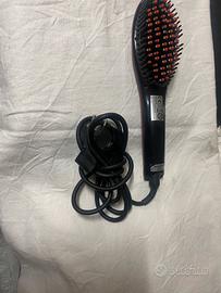 Spazzola riscaldante lisciante   per capelli