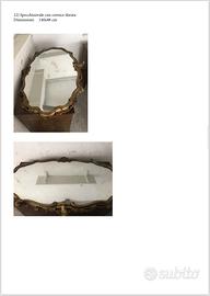 specchio ovale dorato