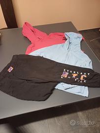 25 t shirt, 2 felpe,1 pantalone lungo ed un golf