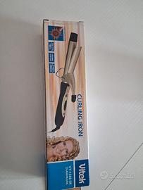 ferro arriccia capelli