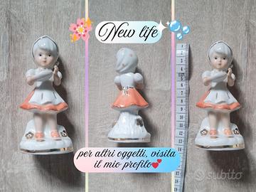 Bambola in porcellana