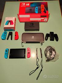 Nintendo Switch OLED completa + giochi + accessori