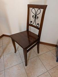 Sedia in legno massello scuro con inserto in ferro