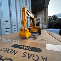 Bruder escavatore su gomma LIEBHERR