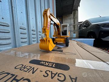 Bruder escavatore su gomma LIEBHERR