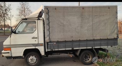 Nissan trade 2,8 telonato