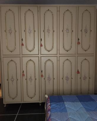 Camera da letto matrimoniale in stile