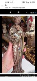 statua antica di san Giuseppe con bambino 
