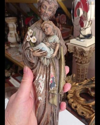statua antica di san Giuseppe con bambino 