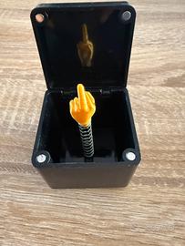 Scatols Dito medio con molla scherzo