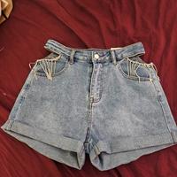 shorts con buchi laterali e brillantini t M 