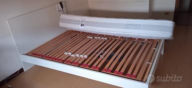 letto completo con rete elettrica.