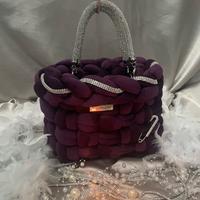 Borsa intrecciata a mano