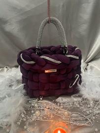 Borsa intrecciata a mano