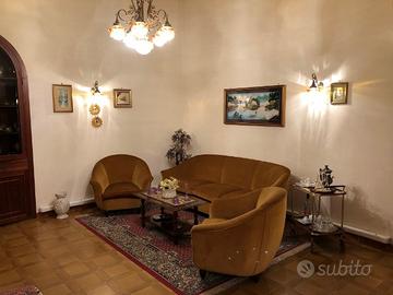 Divano con due poltrone in velluto anni 60