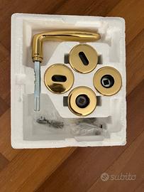 Maniglia Olivari, modello Flaminia, ottone lucido.